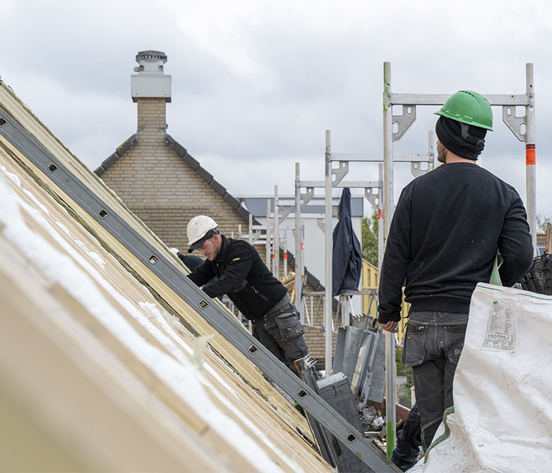 Roofing team working at height